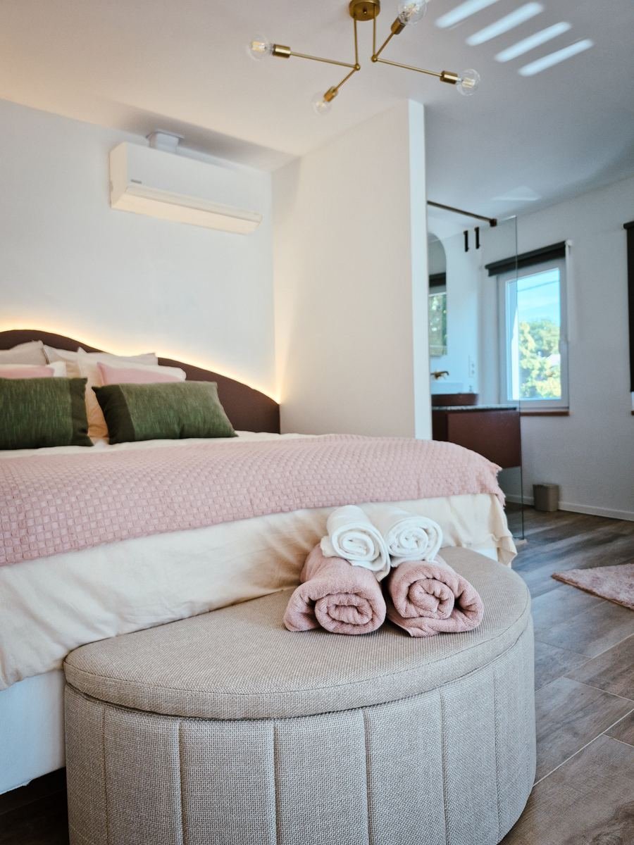 Lit double de la suite Maison H à Herstal